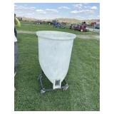 Bulk bin for feed with trap door