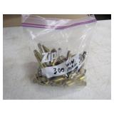 39-300 Win Mag Brass & 1 Live Round