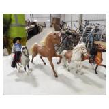 4 Plastic Horses, 1 Cowboy Figurine