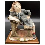 G. Armani Sad Boy at Desk Sculpture