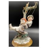 G. Armani Children on Swing Sculpture