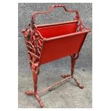 Red Metal Magazine Stand