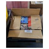 box of assorted books