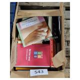 box of assorted books