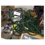 3 garden hoses and sprinklers