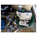 2 garden hoses w/ sprinklers