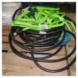 lot of water hoses w sprinkler