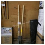 set of post hole diggers