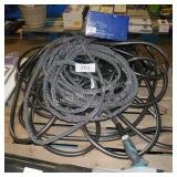 2 water hoses and sprinklers