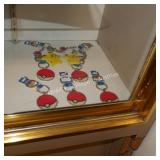 7 pokemon keychains (display)