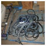skid of water hoses and sprinkler