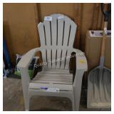 tan plastic chair (damaged)
