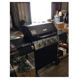 1 LOT DYNA GLOW 4 BURNER GAS GRILL