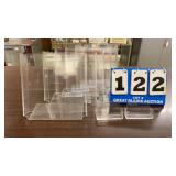 Lot of 7 Clear Plastic Stands