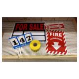 Signs and Roll of Caution Tape