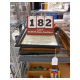 9 frames with restaurant equipment and awards