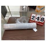 Partial roll of plastic glass stick/protection