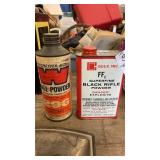 Empty black powder cans