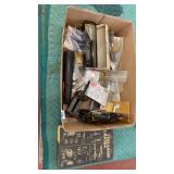 Box lot of firearm parts and book