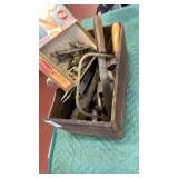 Old wooden box of hardware and old tools