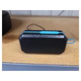 Waterproof Bluetooth speaker with charging cord