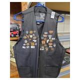 Leather vest size 40 with pins approx 38 pins
