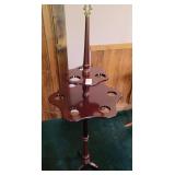 Hmmm? Umbrellas rack, scarfs? Looks like mahogany