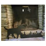 Fire screen with metal decorations