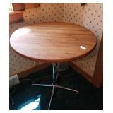 Round wood table 30 in wide and 29 in high with