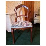Upholstered carved side chair