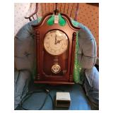 Wall clock and alarm clock, not the chairs