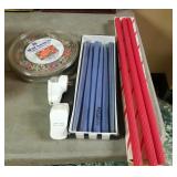 Lot of candle tapers, puzzle, and 2 plug in wall