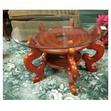 Glass topped wood accent table 24 in wide and 14