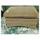 Tan/back stripped upholstered ottoman