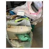 Singer sewing machine & lot of coathangers