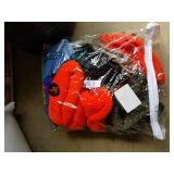 Plastic bag of winter hats, gloves and scarves