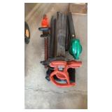 Two leaf blowers and hedge trimmer electric