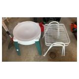 2 plastic and 2 metal outdoor tables