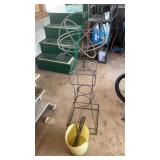 Yard decoration and bucket of metal spikes