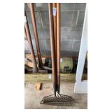 Three metal rakes