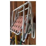 Two folding lawn chairs