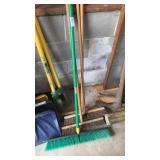 Four push brooms