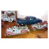 2 Hubley cast fire trucks, windup Studebaker