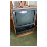 Panasonic TV & Sharp VHS in cabinet