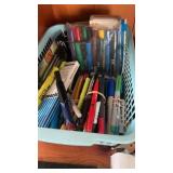 Basket with markers , pens, pencils banking bags
