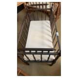 1 wooden older crib