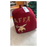 Jaffa hat with pins on it