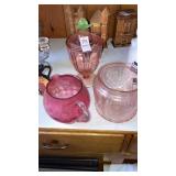 Pink depression jar w/green flower finial &