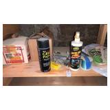 Shelf lot of grill items and hooks