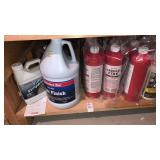 Shelf lot of drain opener and floor stripper